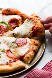 This Homemade Pizza Dough Recipe Is Great For Beginners And Yields A Soft And Chewy Pizza Crust Homemade Pizza Crust Homemade Pizza Homemade Pizza Crust Recipe