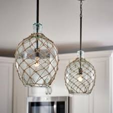 Kichler Montane Olde Bronze Coastal Tinted Glass Globe Pendant Light Lowes Com Glass Globe Pendant Glass Globe Pendant Light Pendant Light