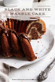 Black And White Desserts Names Marble Cake Is The Ultimate Marble Pound Cake Dense Moist Crumbly Recipe In 2020 Marble Pound Cakes Marble Cake Dessert Recipes Easy