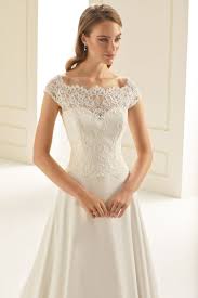 A big white, over the top wedding dress. Good Wedding Dresses For A Big Bust The Boutique Co Bridal