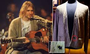 Find this pin and more on cobain by kaj juutilainen. Kurt Cobain S Cigarette Burned Sweater Sells For 334 000 Daily Mail Online
