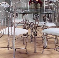 Our models help expand and accent any room, especially the dining room, in order to create the perfect space to share meals, converse over coffee or simply leaf through a favorite book or magazine. Glass Top Wrought Iron Dining Table Ideas On Foter Wrought Iron Dining Table Round Glass Dining Room Table Glass Dining Room Table