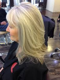 Long Layered Haircut With Pattern Matching Blonde Highlights On Natural Gray Hair Dres Hair Salon Spa Blonde Highlights Long Layered Haircuts Long Gray Hair