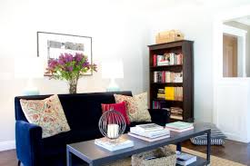 This sofa is hard to see on the left but you can see that it has large rounded arms. Cool Down Your Design With Blue Velvet Furniture Hgtv S Decorating Design Blog Hgtv