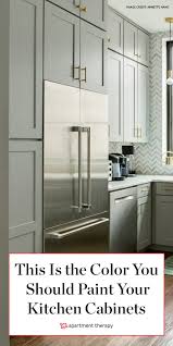 The cabinetry chooses the white and brown cupboards and the drawers. This Is The Color You Should Paint Your Kitchen Cabinets According To Experts Kitchen Cabinets Color Combination Kitchen Cabinet Trends Kitchen Color Trends