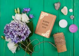 Our bouquets are great for all occasions. Free Photo Top View Of Happy Every Day Card And Flowers Twine Candles With Flower Petals On Green Background