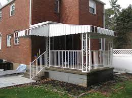 Installed awning on the side windows of residential home: Awnings Pittsburgh Pa Retractable Aluminum And Canvas Awnings