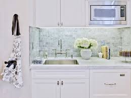 Caeserstone white counters glass mosaic backsplash. The Classic Beauty Of Subway Tile Backsplash In The Kitchen