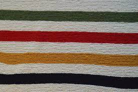 The pillow with colorful stripes is made with bravo big and is a perfect match to the blanket. Hudson Bay Inspired Blanket Home Knitted Not The Woven Original Master In The Kitchen