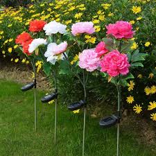 What are the shipping options for decorative garden stakes? 96 Solar Flower Lights Ideas