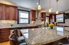 These white granite countertops with black veins running throughout are accentuated when placed atop cherry cabinets for a traditional inspired kitchen or bathroom. Viscont White Granite Countertops With Cherry Cabinets Contemporary Kitchen Boston By Stone Projects Houzz