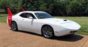 Dodge, an american automobile brand, produced three separate vehicles with the name dodge charger daytona, all of which were modified dodge chargers. Reinterpreted 2013 Dodge Challenger Daytona