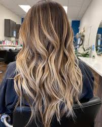 Going with blonde highlights while keeping dark roots is a trendy way to hide those pesky gray hairs. Hottest Hairstyle Ideas For Women With Light Brown Hair