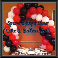 Did A Sports Baby Shower For My Step Sister Here Is A Balloon Arch Over Her Cake The Theme Was Sports But U Sports Baby Shower Balloon Arch Baby Shower Cakes