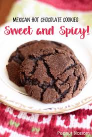 In a medium bowl, cream the butter and sugar. Foolproof Mexican Hot Chocolate Cookies Peanut Blossom