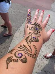 Is there anywhere else in the world that does henna tattoos? Henna Tattoos Are A Must Do In Morocco At Epcot Disney Trips Henna Tattoo Henna Hand Tattoo