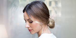 Make a low head ponytail and tuck it up thereby parting the hair and twisting it one or two times. 11 Ways To Make Your Bun Look Less Basic