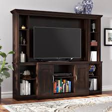 Crafted of manufactured wood in a fashionable finish, this tv stand strikes an open silhouette on six black tubular plastic posts. 10 Best Entertainment Centers Ideas On Foter