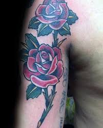 50 Traditional Rose Tattoo Designs For Men Flower Ink Ideas Rose Tattoos For Men Traditional Rose Tattoos Rose Tattoos