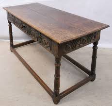 A drop leaf coffee table is a handy way to expand the use of your living room or even a hallway space. Oak Coffee Table In Antique Jacobean Style