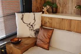 This rustic bedroom in silicon valley brings the outdoors in with a set of large glass doors. Log Cabin Interior Design Cabin Decor Ideas