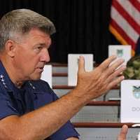 Cpl. Adam Keys, center, prepares for his tenth jump