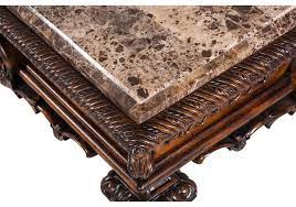 On top, a richly veined slab of stone creates the perfect place for a stack of books and beverages. Lacks Casa Mollino Coffee Table
