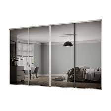Inspiration for a country master light wood floor the master bedroom was designed with a sliding door feature allowing light from the main spaces. Classic Mirrored White 4 Door Sliding Wardrobe Door Kit H 2260mm W 2978mm Diy At B Q