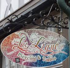 hannover kramerstrasze 8 la ligne piercings en tattoos uithangborden