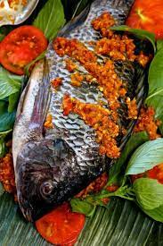 Indonesian Spicy Baked Tilapia Wrapped In Banana Leaves Aka Pepes Ikan Mujair Cooking Seafood Baked Tilapia Tilapia