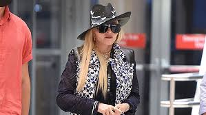 By madonna does it better · updated about 3 weeks ago. Madonna Wearing Louis Vuitton Vest And Fedora At John F Kennedy Airport Hollywood Life Algulf