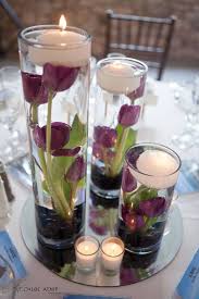 Candles are another classic wedding reception centerpiece. Pin By Caitlin O Neill On Arranjos Para Decoracao Wedding Centerpieces Floating Candles Candle Centerpieces