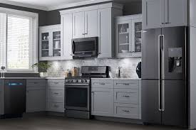 Kandra kole interiors gave this traditional kitchen a retro lift thanks to red appliances and black cabinetry. New Black Stainless Steel For Appliances Blogs Forums