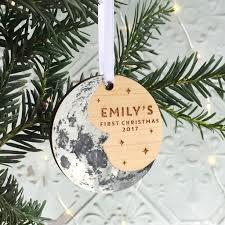 Or capture a teeny handprint or footprint on their first christmas ornament. Baby S First Christmas Moon Tree Ornament By Betsy Benn Notonthehighstreet Com