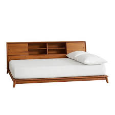 | you can build a simple storage bed to elevate a mattress and provide extra storage with these simple plans. Mid Century Side Storage Platform Bed Acorn