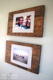 Add a rustic touch to your home décor with this monogram pallet wood wall hanging. Easy To Make Picture Frame And Wall Display Bringing Rustic And Simple Elements To A Wall Decor Our House Now A Home Diy Picture Frames Pallet Picture Frames Making Picture Frames