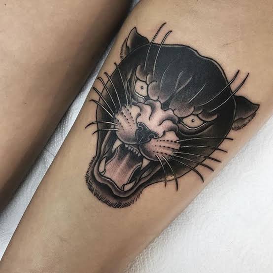 Tattoo design: Panther head in black and grey | Panther body tattoo, Traditional panther head tattoo