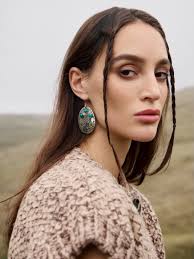 Stars caught in silver, punctuated by quiet sparks. Myra Prairie Moon  Earrings in Desert Steel 🔍SKU: S-13444 Myra Arroyo Stone Bracelet in Halo  Teal 🔍SKU: S-13573 Myra Wild Saguaro Earrings in Moon