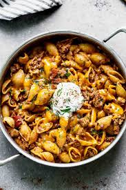 Shred your cheeses and dice green onion. One Pot Turkey Mexican Pasta Cooking For Keeps