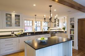 For a more modern still timeless kitchen, light stained cabinets will be great. Timeless Kitchen Riverlight Builders Inc