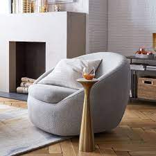 Add a touch of elegance and personality to your room with an upholstered arm chair. Cozy Swivel Chair Swivel Chair Living Room Living Room Chairs Furniture