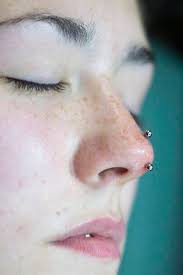 Jewelry for the septum area. Tips And Tricks To Learn Before Getting A Nose Piercing Nose Piercing Nose Piercing Stud Rhino Piercing