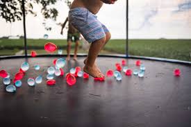 First, all the kids have to position themselves on the trampoline before another party throws them the ball. Kb0hvuxcg3lhcm