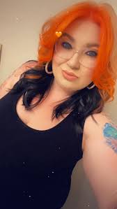 One YEAR with our new EAR !👂🏻” and festive Halloween hair too! Looking  GREAT, Miss Daisy! 🌼