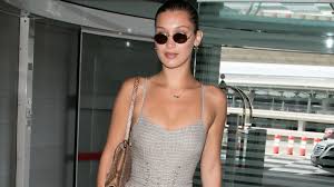 Anyone who is a fan of bella hadid knows just how much inspiration the star drawers from the 90s so it doesn't come as a surprise that bella decided to also rock a very clueless inspired outfit. Bella Hadid And Kendall Best Airport Style Glamour