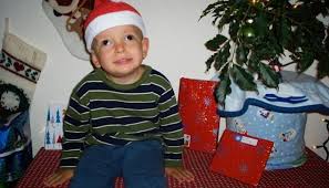 Happy parents and child at home celebrating new year. The Best Christmas Toys For Blind Children Wonderbaby Org