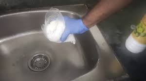 how to open blocked kitchen sink using