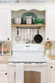 Over The Stove Organizer When You Store Your Pots And Cooking Utensils Above Your Stovetop Everythin Kitchen Remodel Small Small Kitchen Storage Tiny Kitchen