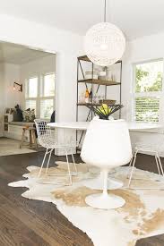 Inside A Neat Girl S Amazing Home Michigan Neat Method Cowhide Rug Dining Room White Dining Table Large Round Dining Table