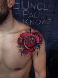 The Dazzling And Dramatic Tattoos Of Greek Artist Uncl Paul Knows Rose Shoulder Tattoo Rose Tattoos For Men Mens Shoulder Tattoo